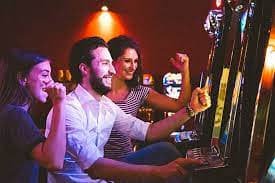 Excited Philippine players placing sports bets on mobile devices